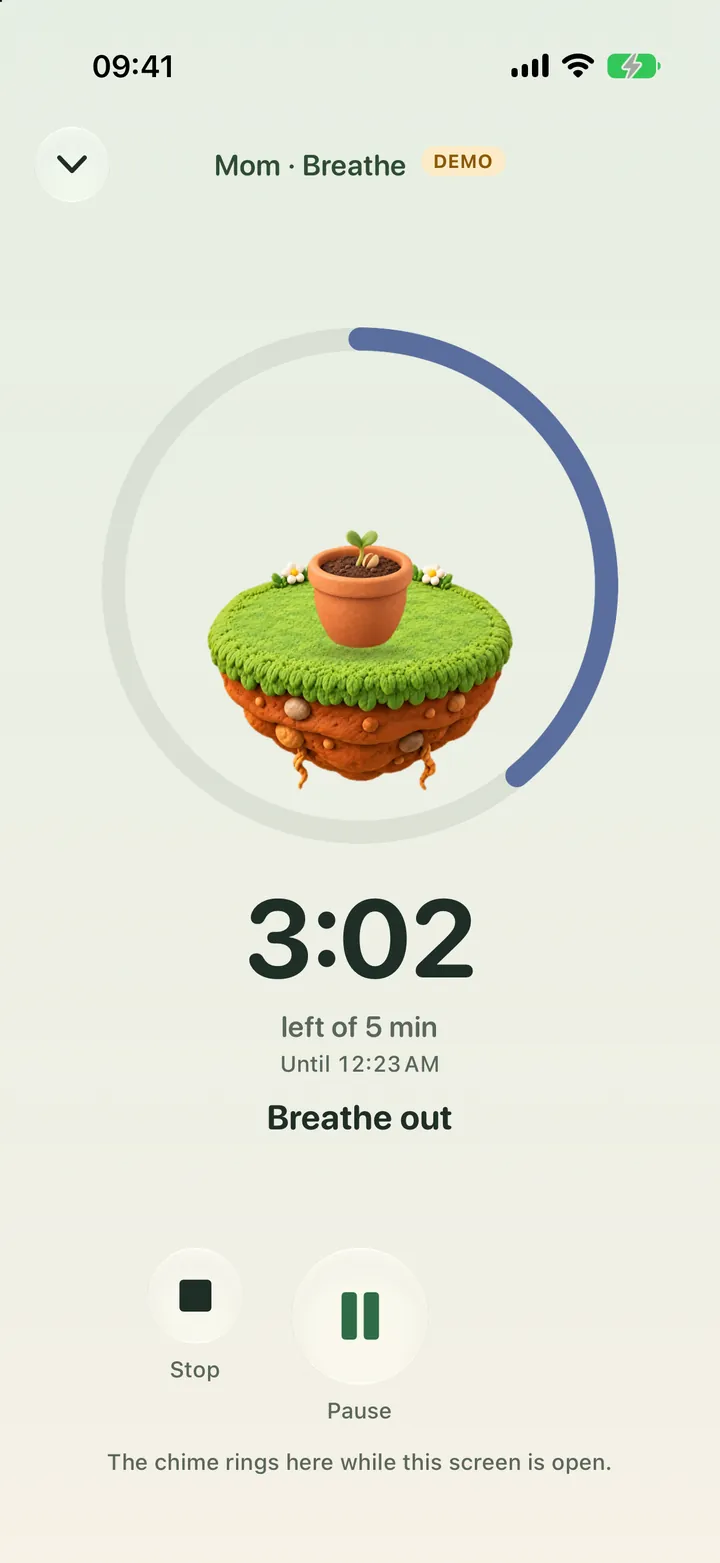 Mom’s breathing session (Demo family): her companion inside a ring that fills as the minutes pass, the time left of 5 minutes in large numbers, the breathing cue, and the Stop and Pause buttons.